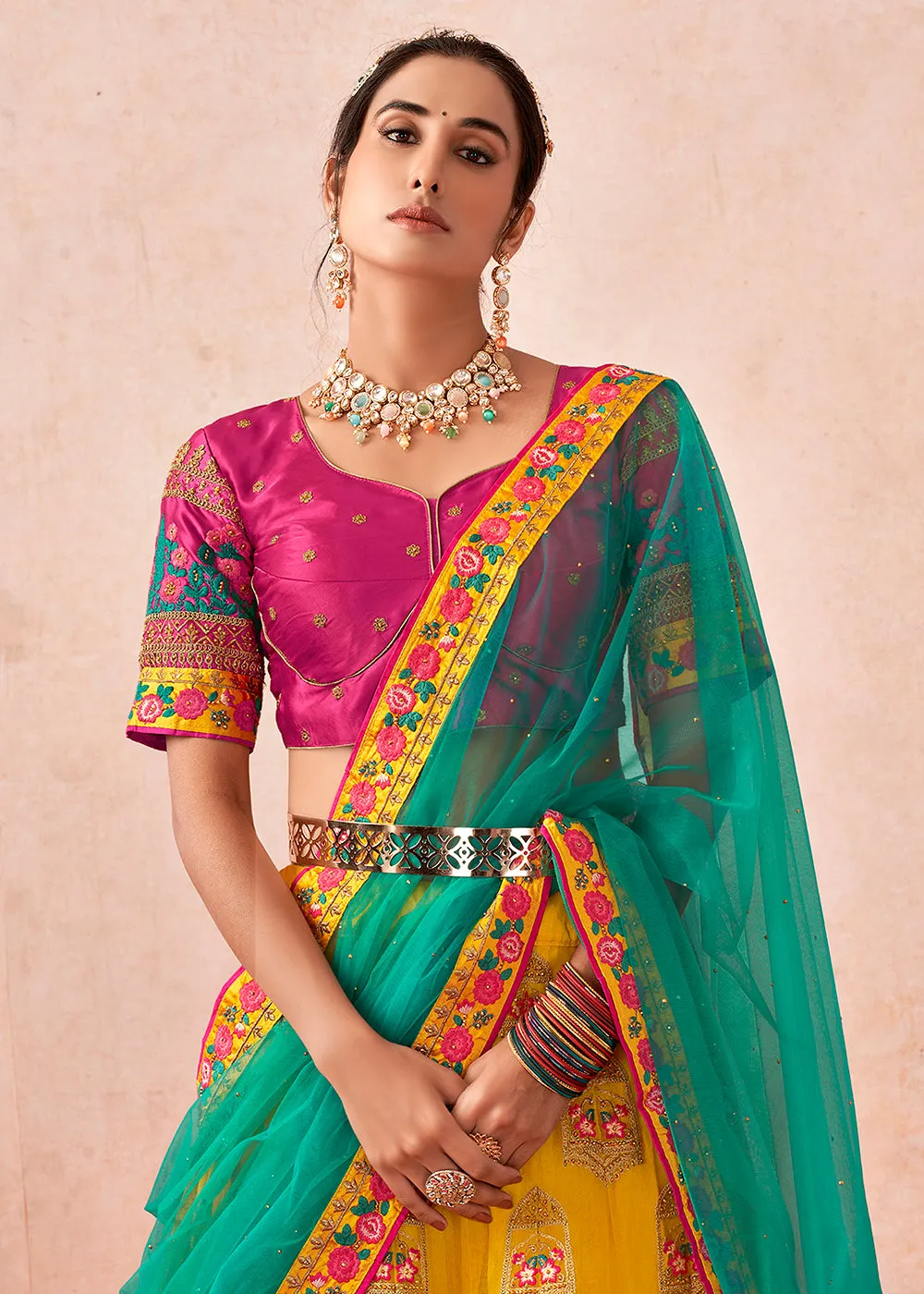 Traditional Yellow & Magenta Kalidar Embroidered Net Lehenga Choli