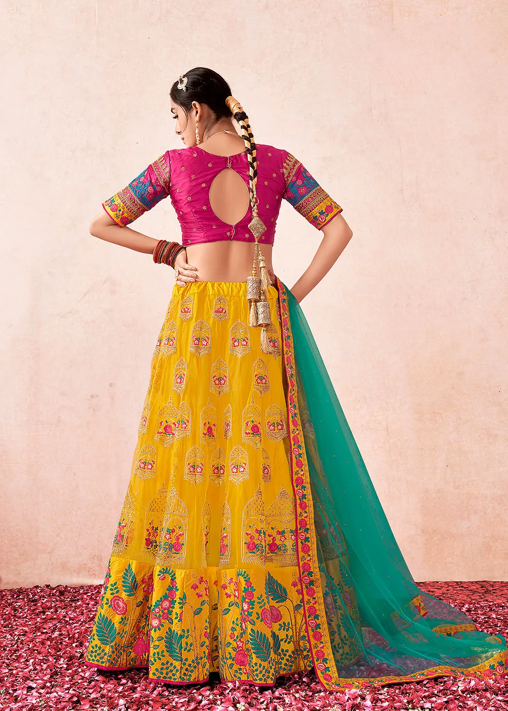 Traditional Yellow & Magenta Kalidar Embroidered Net Lehenga Choli